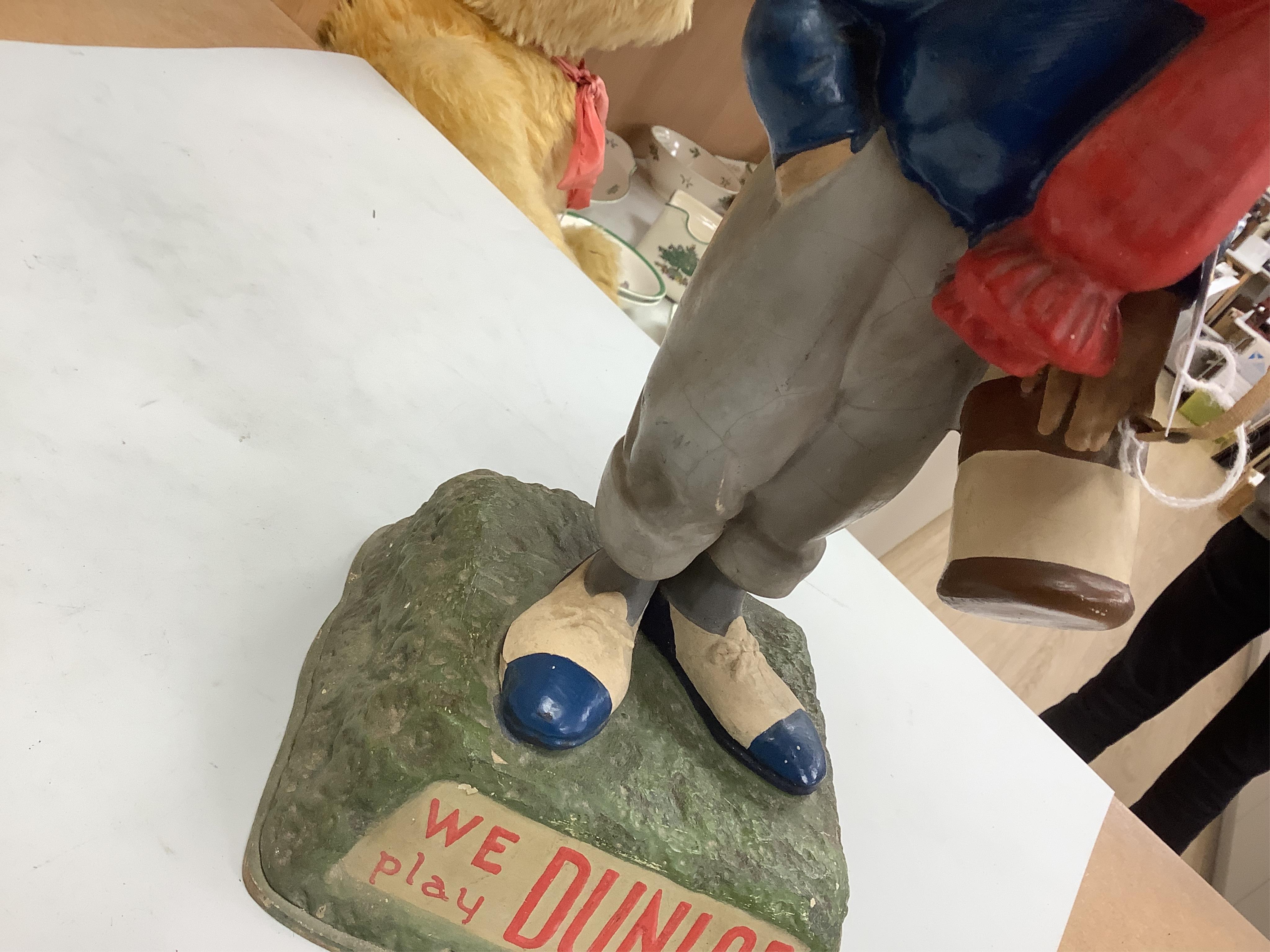 An advertising Dunlop Man composite figure of a golfer, 40cm